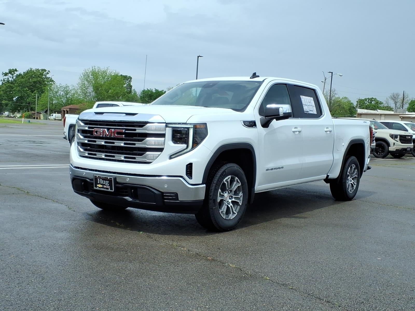 2026 GMC Sierra 1500 SLE in Summit White — front three-quarter view